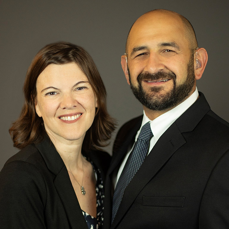 The Feldmans sit for a headshot